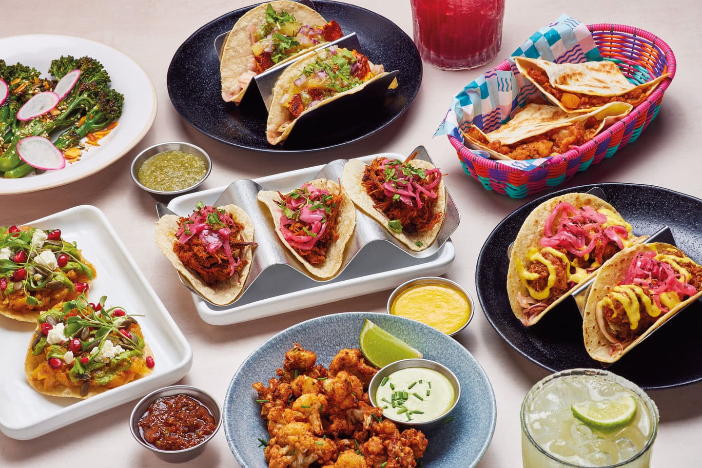 Lots of Wahaca dishes for sharing in our Favourites set menu, paired with a classic and hibiscus margarita