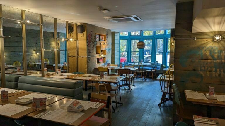 Islington restaurant seating and large window to street