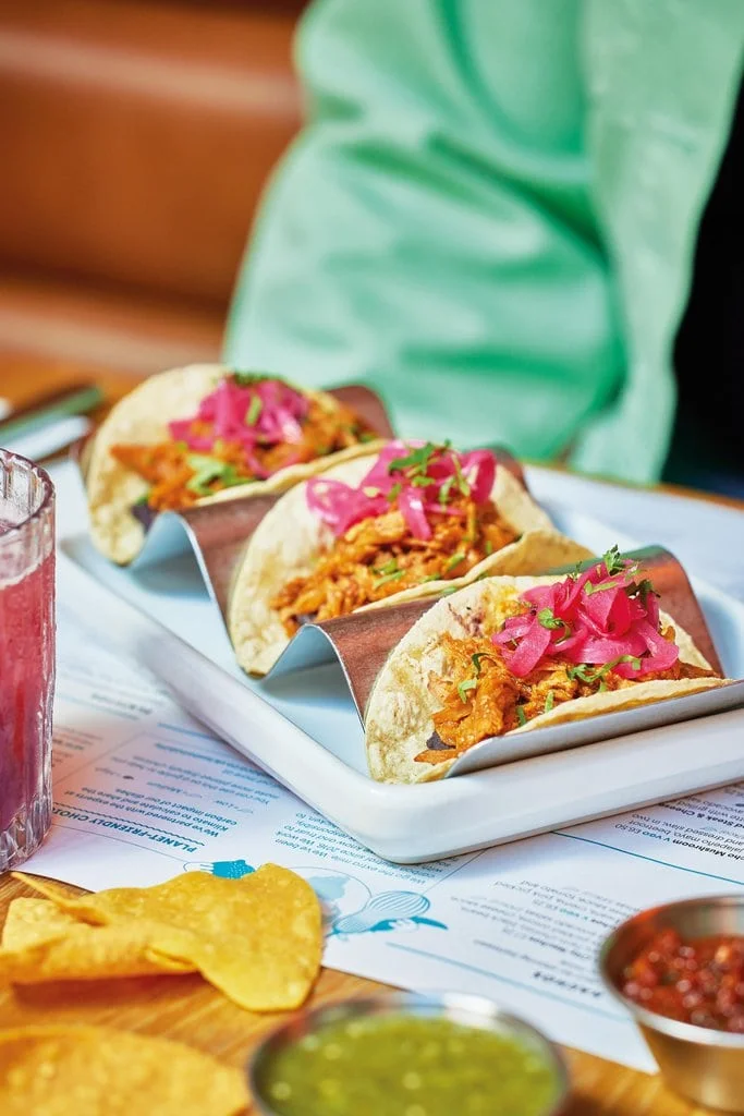 Three pork pibil tacos, a traditional dish from Mexico and favourite on the Wahaca menu
