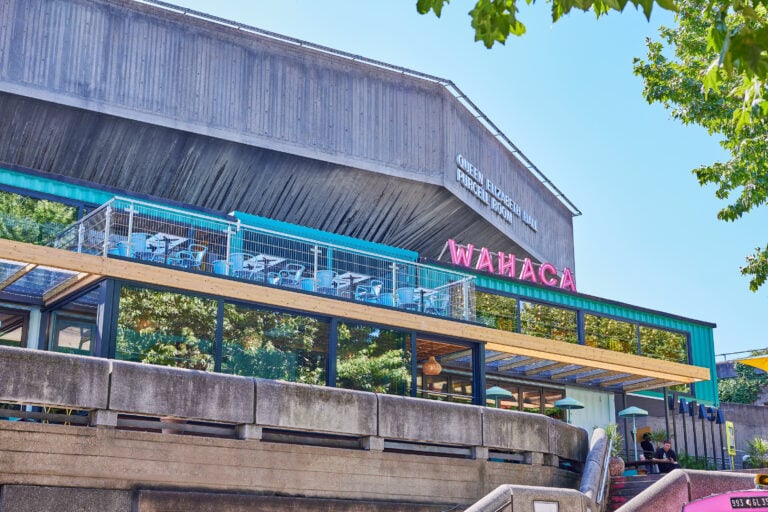 Wahaca Southbank outside, with terrace seating and large windows overlooking the Southbank