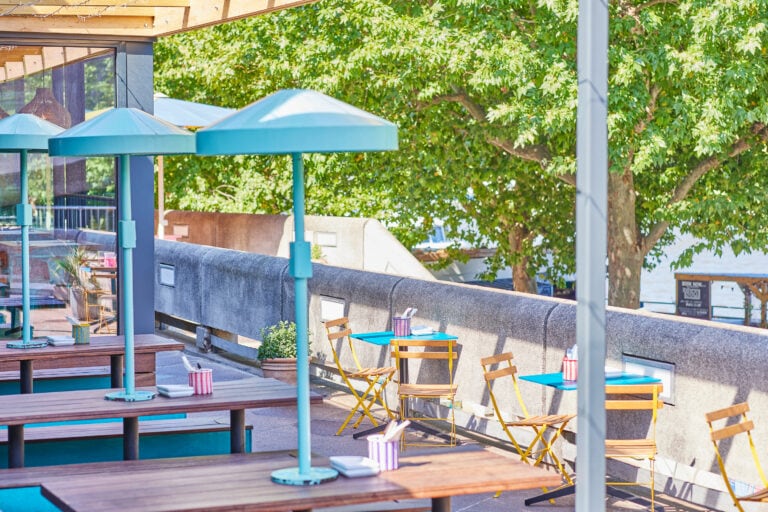 Outdoor seating for bigger and smaller groups in the sunshine at Wahaca Southbank