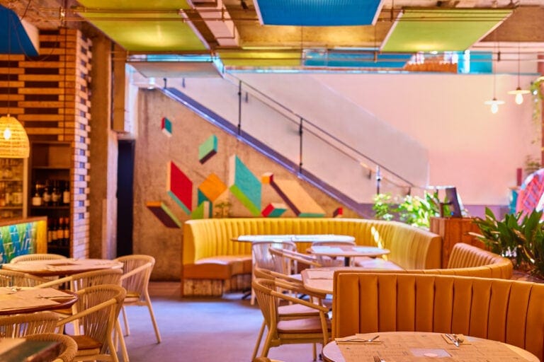 Colourful warm interior of Wahaca Covent Garden