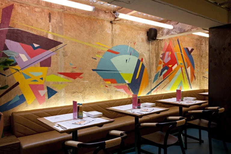 Colourful wall mural at Wahaca Oxford Circus