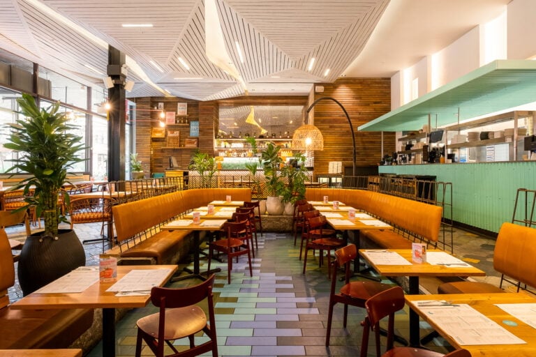 restaurant interior seating and bar at wahaca stratford