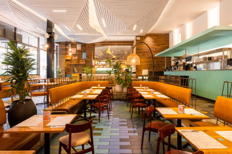 restaurant interior seating and bar at wahaca stratford
